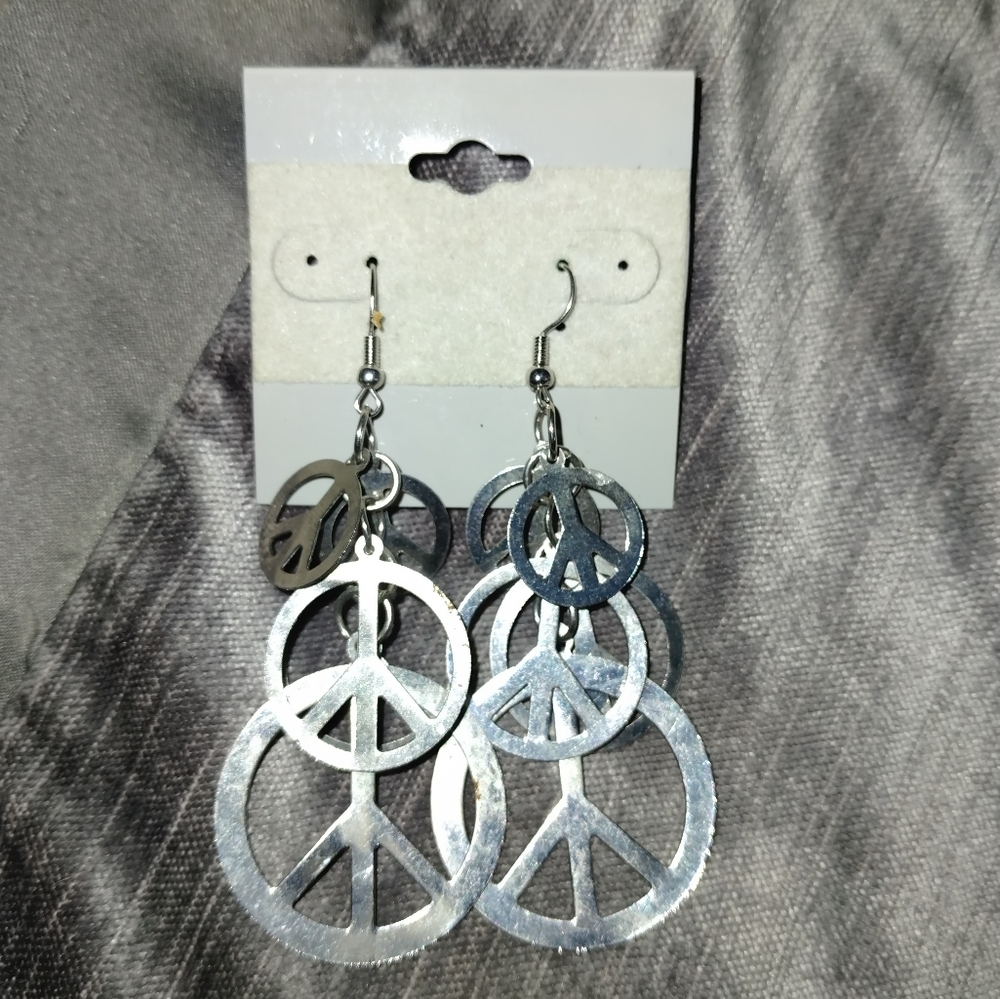 Vintage Peace dangling earrings. Never worn..